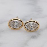 Yellow Gold Bezel Set Oval Cut Lab Grown Diamond Stud Earrings