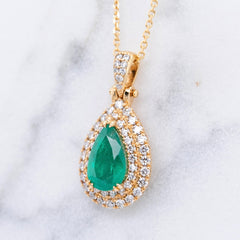 Emerald and Diamond Halo Pendant