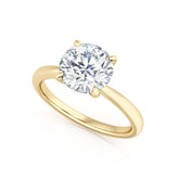 Round Four Claw Diamond Solitaire Engagement Ring
