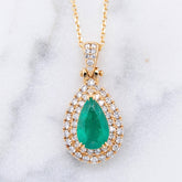 Emerald and Diamond Halo Pendant