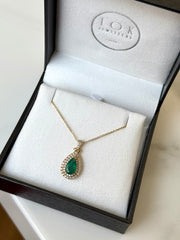 Emerald and Diamond Halo Pendant