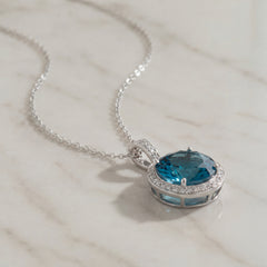 18k White Gold Topaz & Diamond Halo Pendant With Chain
