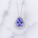 Pear Shaped Tanzanite and Diamond Halo Pendant