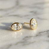 Yellow Gold Bezel Set Oval Cut Lab Grown Diamond Stud Earrings