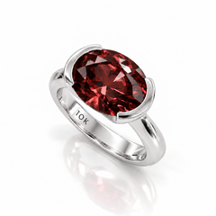 East West Oval Cut Garnet Pinky Ring