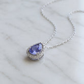 Pear Shaped Tanzanite and Diamond Halo Pendant