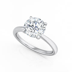 Round Four Claw Diamond Solitaire Engagement Ring