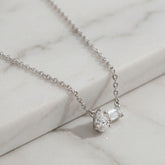 18k Pear Shape & Emerald Cut Diamond Necklace