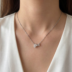 18k Pear Shape & Emerald Cut Diamond Necklace
