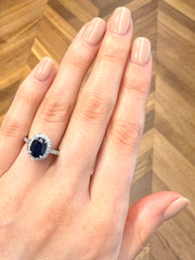 Oval Sapphire and Diamond Halo Cocktail Ring