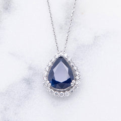 Pear Shaped Sapphire and Diamond Halo Pendant